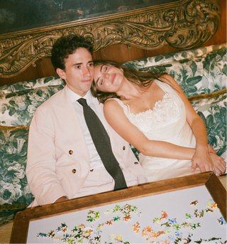 Two wedding photos: one with a couple in a garden and another with a couple embracing indoors.
